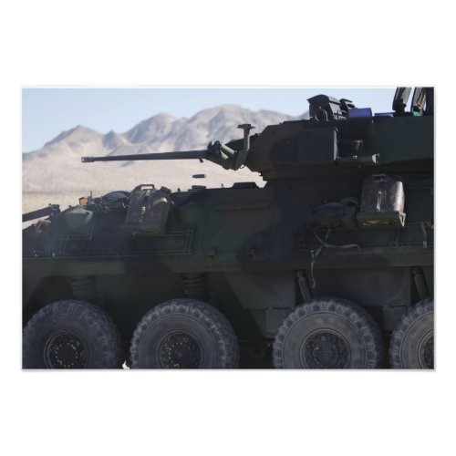 A light armored vehicle fires photo print