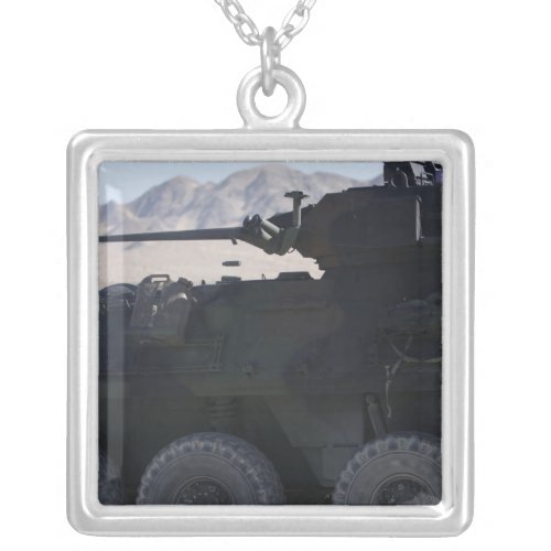 A light armored vehicle fires silver plated necklace