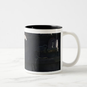 A light armored vehicle fires Two-Tone coffee mug