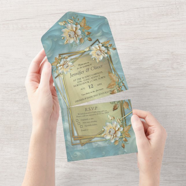 A light blue palette in front of a copper/bronz all in one invitation (Tearaway)