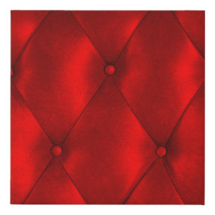 A lip print left by lipstick on white paper. Kiss