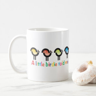 A Little Birdie Told Me! mug with colorful birds.