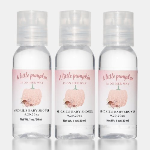 A Little Pumpkin Peach Glitter Baby Shower Hand Sanitizer - This autumn baby shower hand sanitizer features a graphic of a pumpkin accented with peach and rose gold glitter and fall colored flowers. This is a perfect party favor for your fall baby shower guests. 