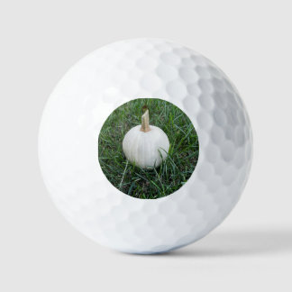 a Little white pumpkin Golf Balls