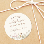 A Little Wildflower Baby Shower In Bloom Boho Classic Round Sticker<br><div class="desc">Bring a touch of bohemian elegance to your baby shower favors with our "A Little Wildflower In Bloom" Boho Stickers! Adorned with delicate wildflowers in full bloom, these stickers add a whimsical charm to any celebration. Whether used to seal envelopes, embellish party favors, or decorate gift bags, these stickers are...</div>