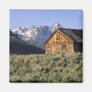 A log cabin and the Sawtooth Mountains in Magnet