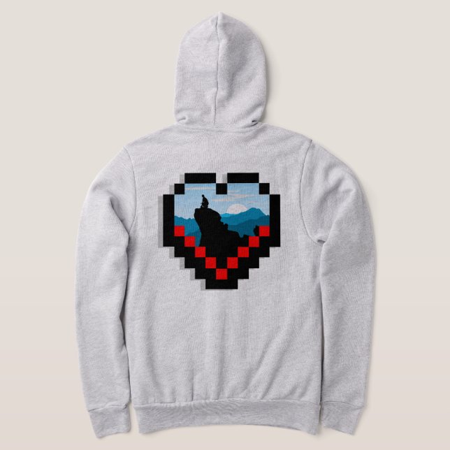 A lone figure sitting on a mountain peak at sunris hoodie (Laydown Back)