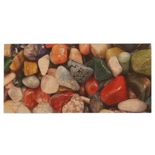 a lot of beautifully colored stones wood flash drive