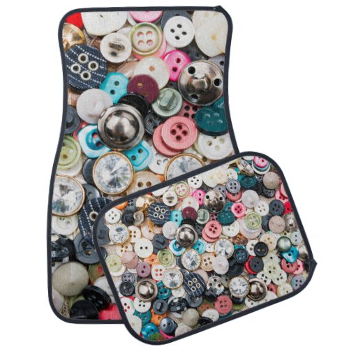 A lot of colorful sewing buttons of different colo car floor mat