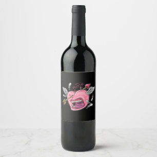 a love heart with lips and wings that are hit by l wine label