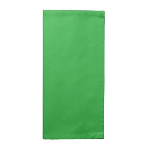 A lush landscape filled with dense green trees and cloth napkin
