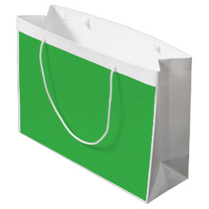 A lush landscape filled with dense green trees and large gift bag