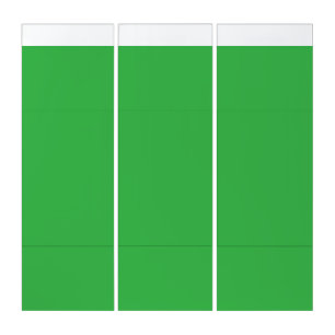 A lush landscape filled with dense green trees and triptych