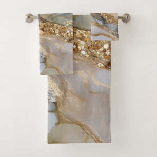 A luxurious gold and white marble background bath towel set