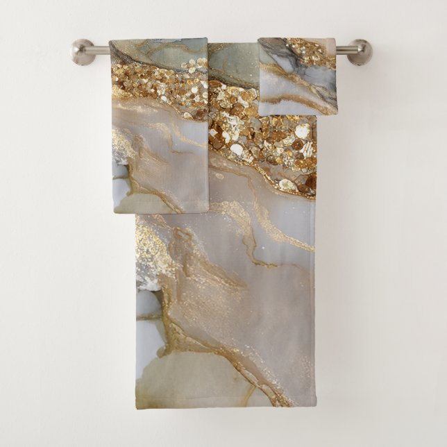 A luxurious gold and white marble background bath towel set (Insitu)