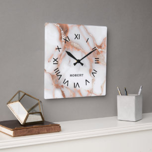 A luxurious rose-gold marble background square wall clock