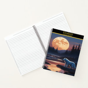 A majestic wolf howling at the full moon at dusk notebook