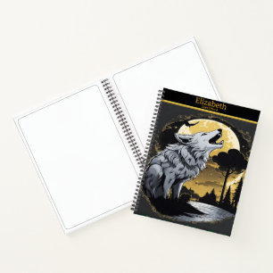 A majestic wolf howls at the glowing moonlight notebook