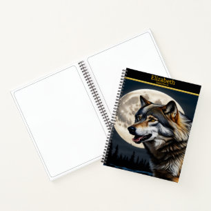 A majestic wolf howls at the luminous moonlit sky notebook