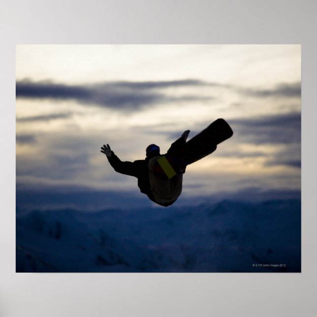 A male snowboarder does a back flip while riding poster (Front)