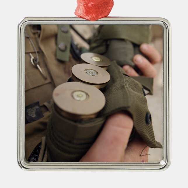 A Marine cradles handfuls of 40 mm grenades Metal Ornament (Front)