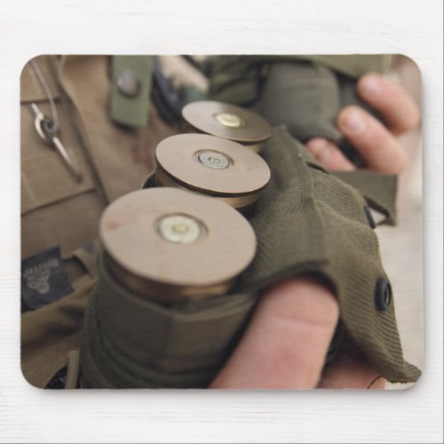 A Marine cradles handfuls of 40 mm grenades Mouse Pad