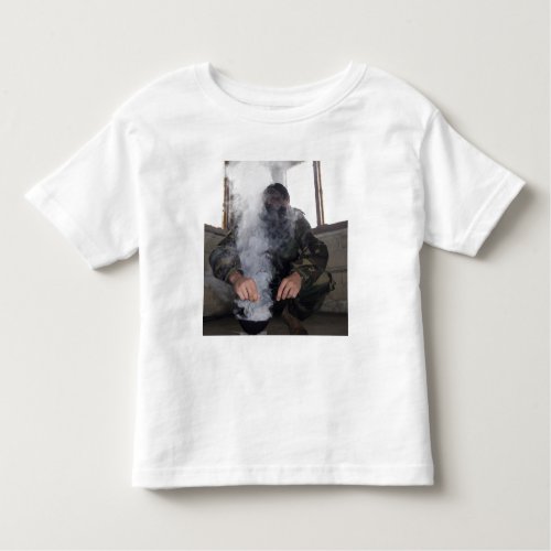 A marine fills the gas chamber with more CS gas Toddler T_shirt