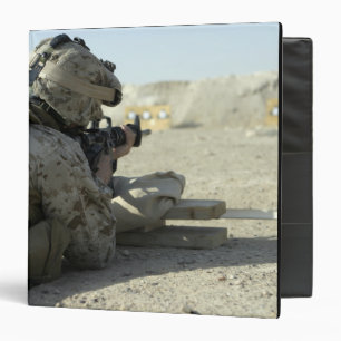 A Marine fires a M16A2 service rifle Binder