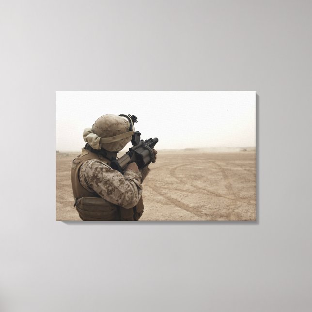 A Marine fires the M-32 Canvas Print (Front)
