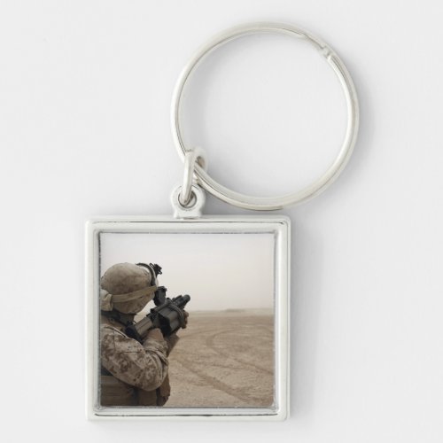 A Marine fires the M_32 Keychain