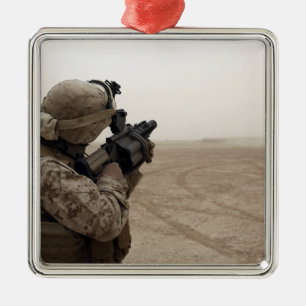 A Marine fires the M-32 Metal Ornament