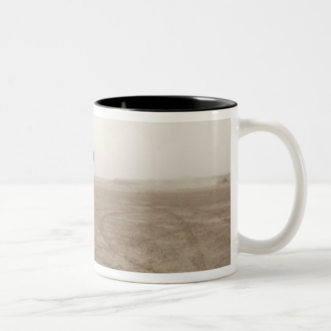 A Marine fires the M-32 Two-Tone Coffee Mug (Right)