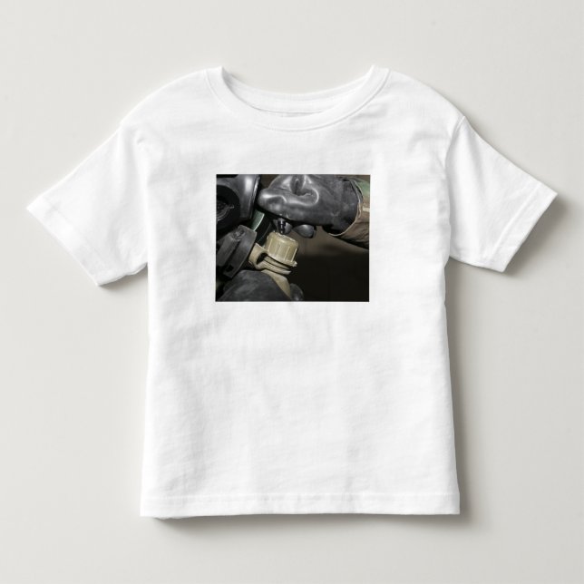 A Marine inserts a drinking tube into his cante Toddler T-shirt (Front)