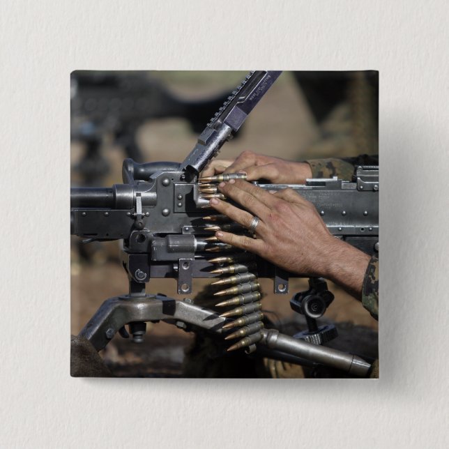 A Marine loads a M-240G machine gun Pinback Button (Front)