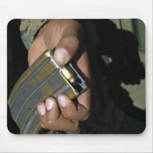 A Marine loads blank ammunition rounds Mouse Pad