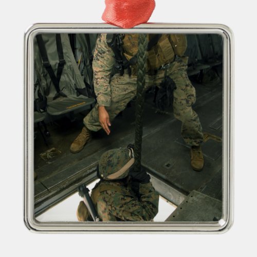 A Marine sends a fellow Marine down the hell ho Metal Ornament