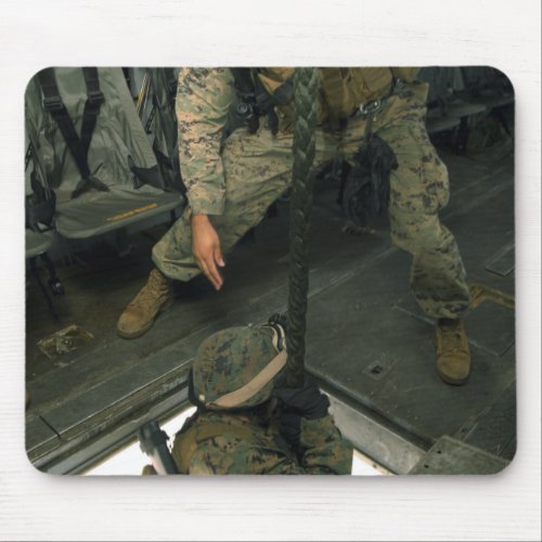 A Marine sends a fellow Marine down the hell ho Mouse Pad