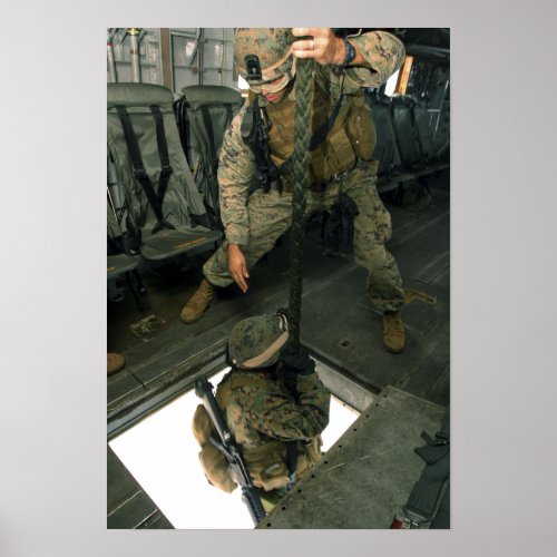 A Marine sends a fellow Marine down the hell ho Poster