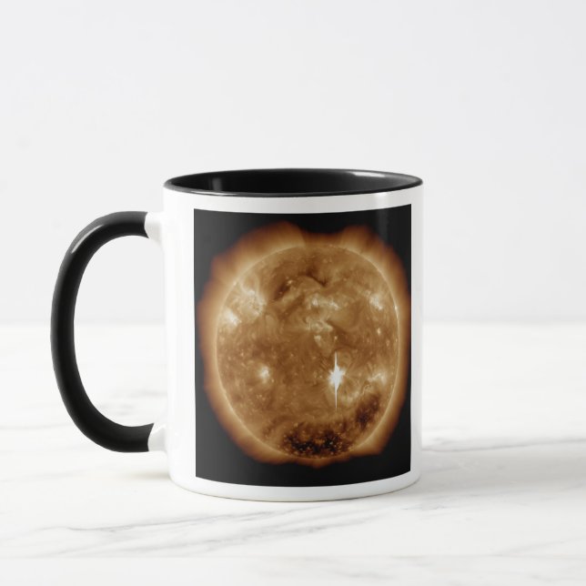 A massive X-class solar flare erupts on the Sun Mug (Left)