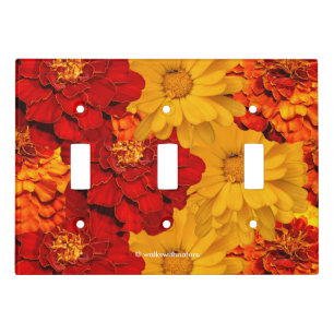 A Medley of Red Yellow and Orange Marigolds Light Switch Cover