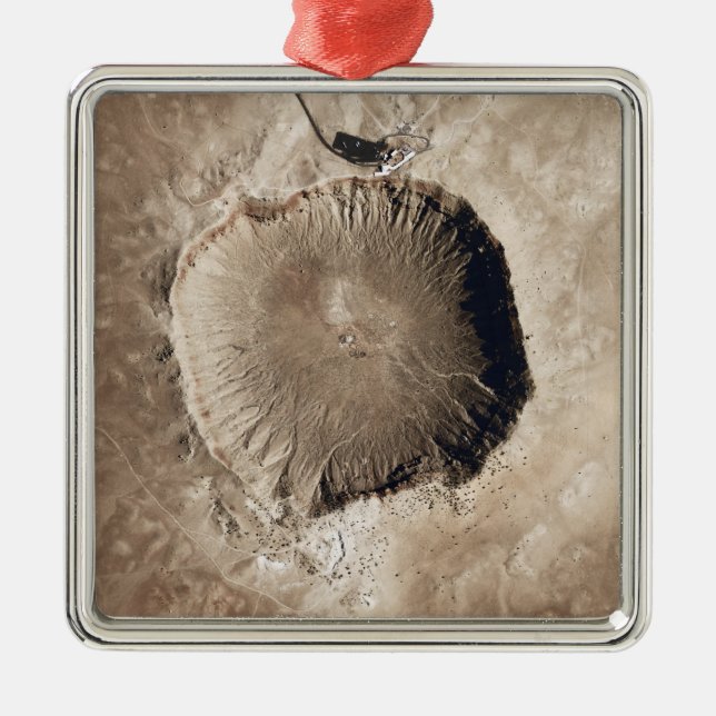 A meteorite impact crater metal ornament (Front)