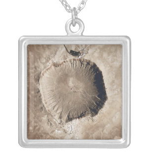 A meteorite impact crater silver plated necklace
