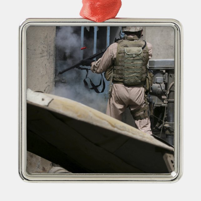 A military policeman uses a breaching round metal ornament (Front)