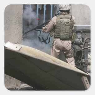 A military policeman uses a breaching round square sticker
