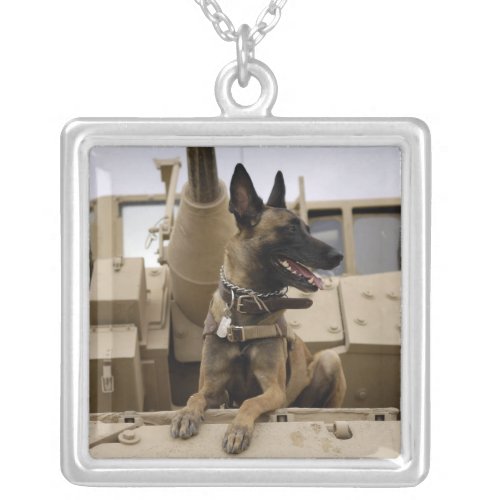 A military working dog sits on a M2A3 Silver Plated Necklace