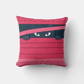 A minimalist stylized cat throw pillow