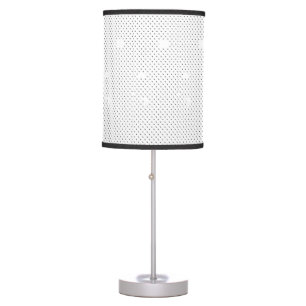 A modern design featuring a sleek combination of w table lamp