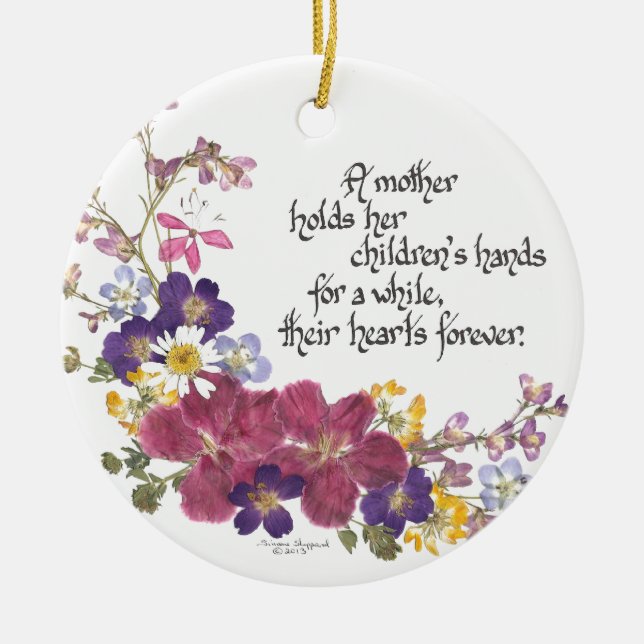 A Mother holds a child's heart Ceramic Ornament (Front)