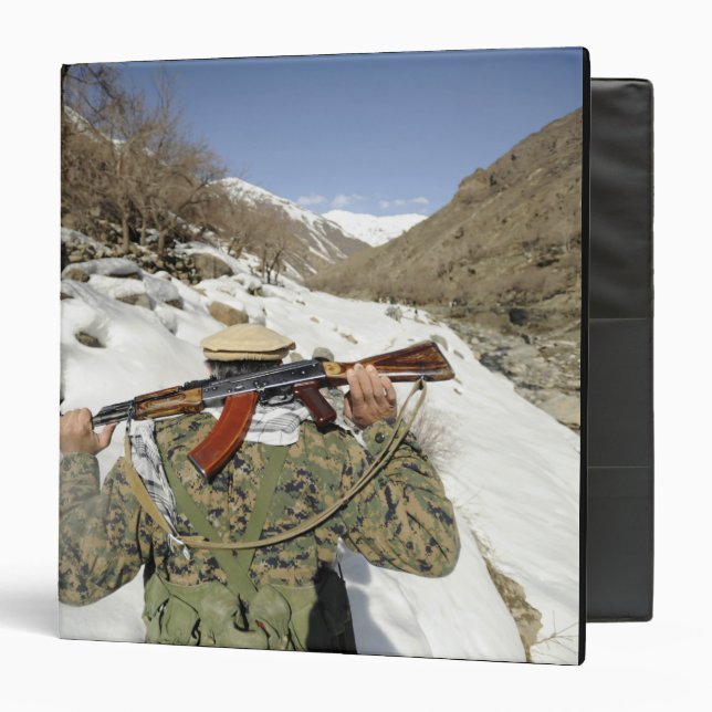 A Mujahadeen Guard walks with US Military membe 3 Ring Binder (Front/Inside)