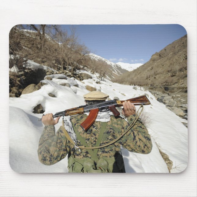 A Mujahadeen Guard walks with US Military membe Mouse Pad (Front)